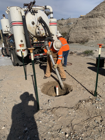 Image of concrete pour at wellhead for well completion at MW-S.
